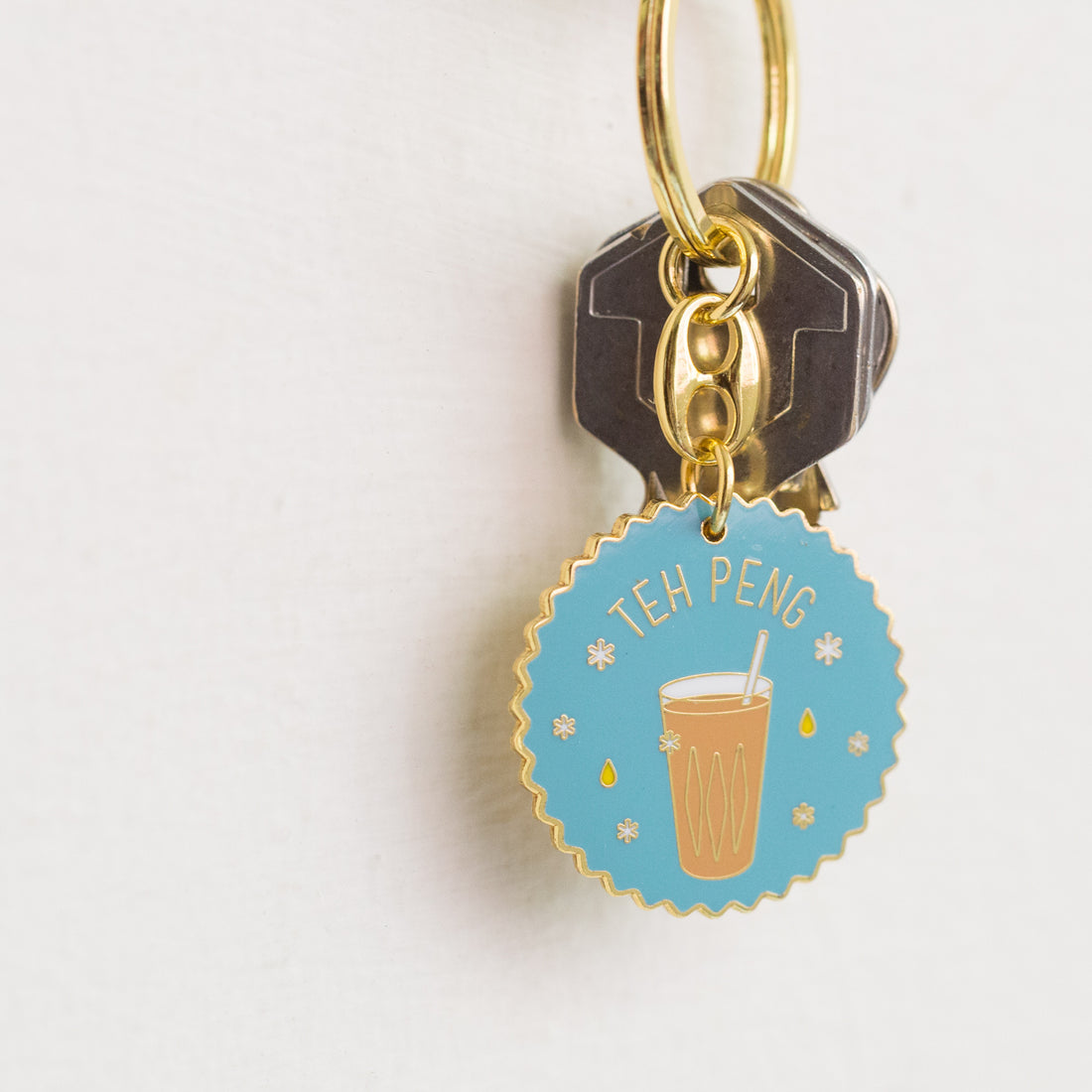 Teh Peng Keychain
